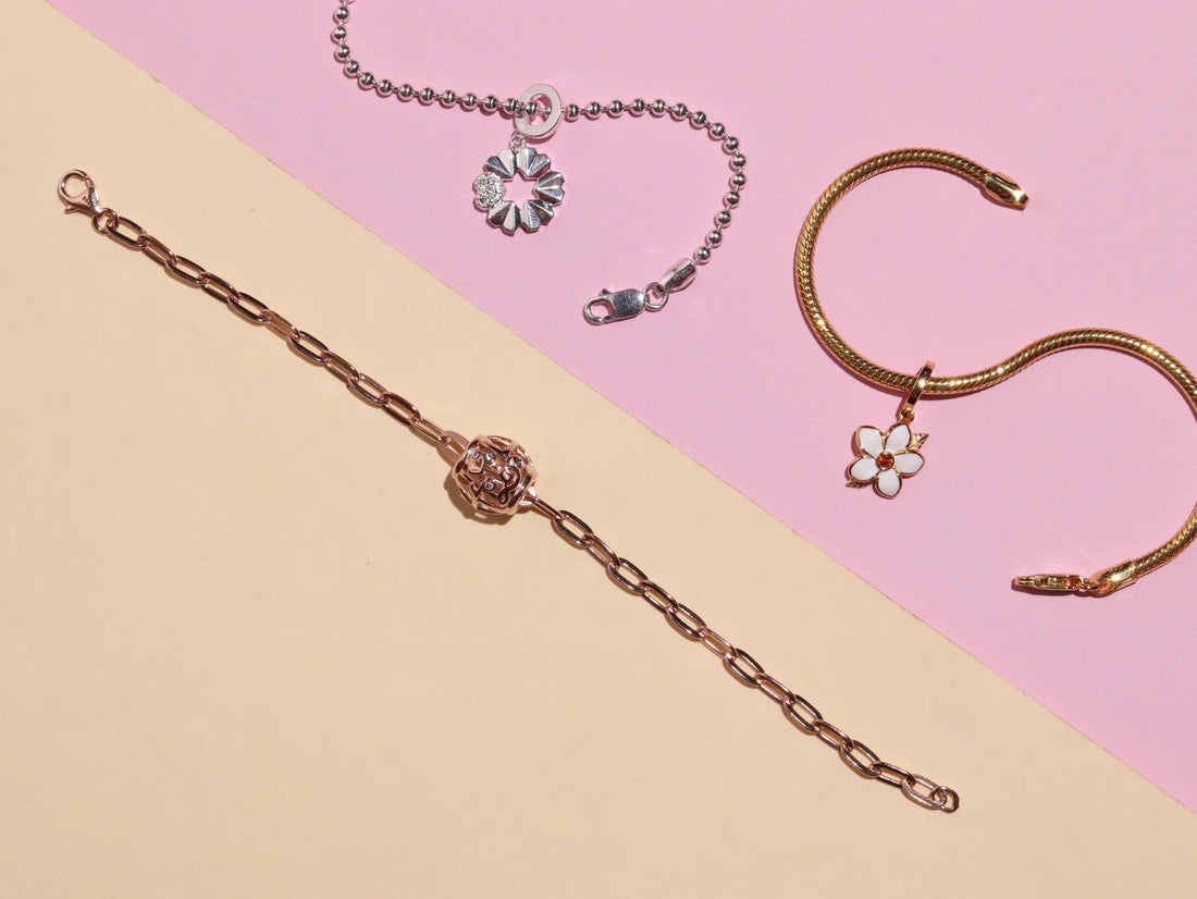 What is the Difference Between Pendants and Charms?